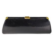 Elongated black snakeskin print clutch