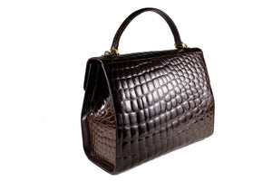 TAIR’S large brown crocodile embossed handbag