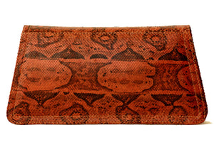 DORCA orange-brown snake skin clutch