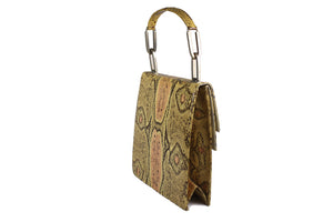 Pressed snake skin handbag in natural color