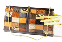 Snake and lizard skin patchwork handbag