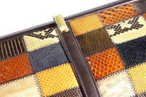 Snake and lizard skin patchwork handbag