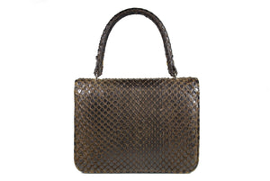 Loewe vintage tote bag. In dark brown caviar or grained…