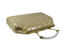Ecru color crochet raffia handbag with lucite handle