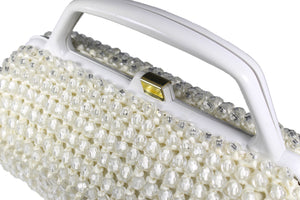 Cylindrical white beaded raffia handbag with clear beads
