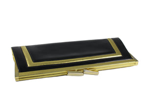 Elongated black and gold leather clutch